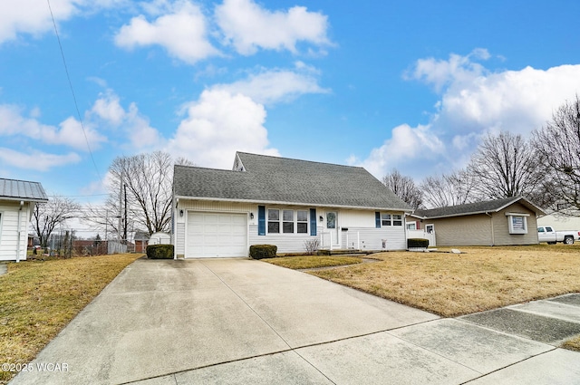 view of front of home featuring a garage and a front yard