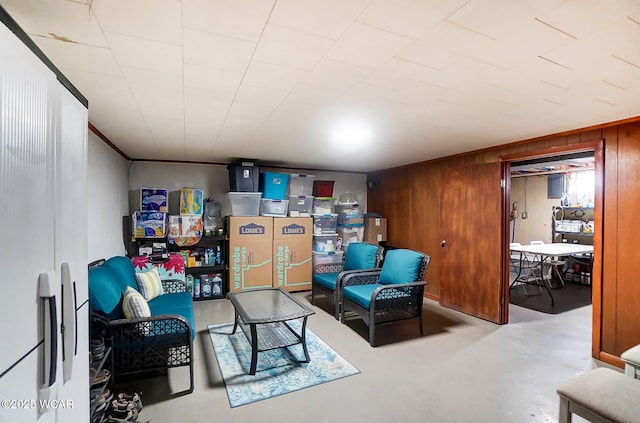 living area with wood walls