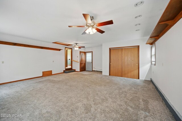 514 S Wayne St, Van Wert, OH 45891 - unfurnished bedroom featuring carpet floors, a baseboard radiator, baseboards, and recessed lighting