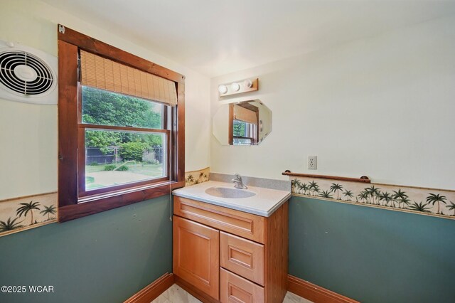 514 S Wayne St, Van Wert, OH 45891 - bathroom with vanity and baseboards