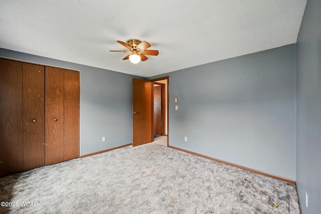 514 S Wayne St, Van Wert, OH 45891 - unfurnished bedroom with carpet flooring, baseboards, a closet, and ceiling fan