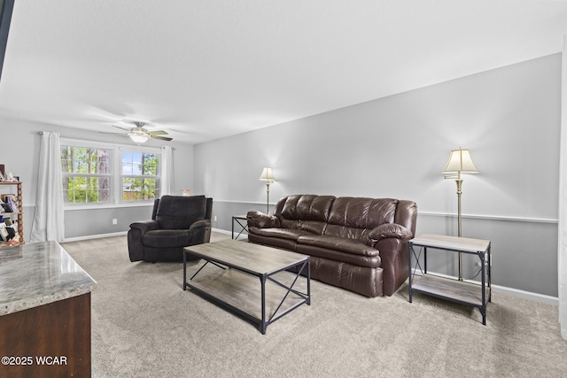 120 Barnsbury Dr, Lima, OH 45804 - carpeted living area with baseboards and a ceiling fan