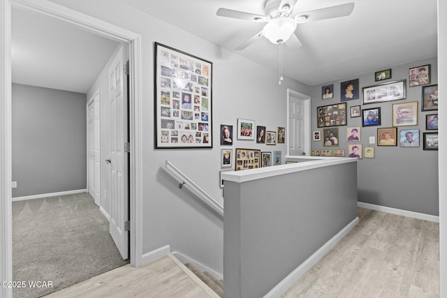 120 Barnsbury Dr, Lima, OH 45804 - hallway with wood finished floors, baseboards, and an upstairs landing