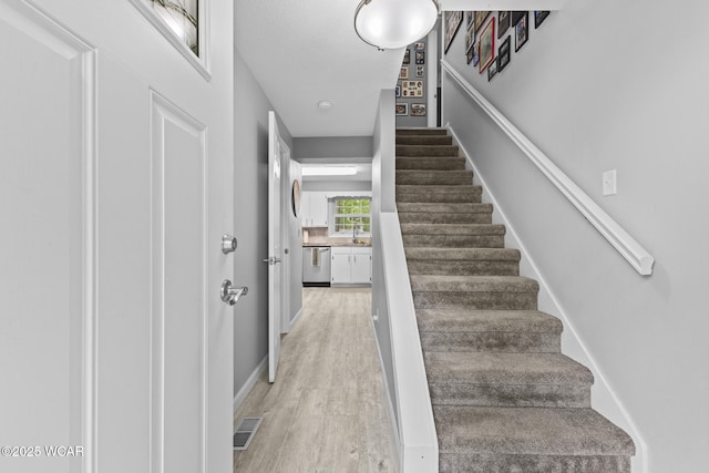 120 Barnsbury Dr, Lima, OH 45804 - staircase featuring wood finished floors