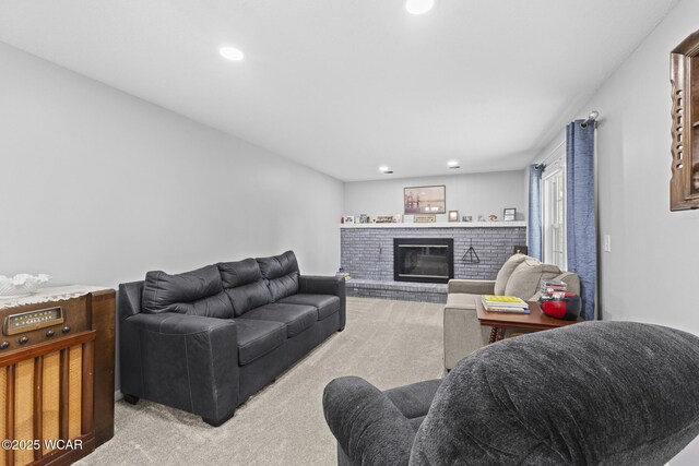 120 Barnsbury Dr, Lima, OH 45804 - living room featuring carpet, a brick fireplace, and recessed lighting