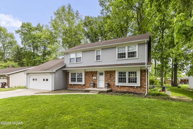 120 Barnsbury Dr, Lima, OH 45804 - view of front facade featuring concrete driveway, an attached garage, a front yard, and brick siding