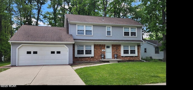 120 Barnsbury Dr, Lima, OH 45804 - view of front of house featuring driveway, a garage, a front lawn, and brick siding