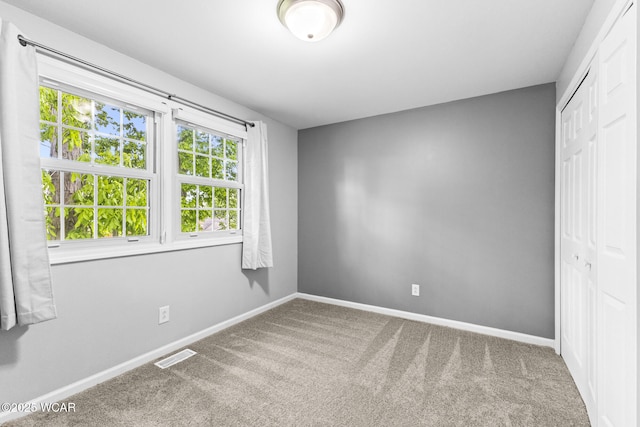 120 Barnsbury Dr, Lima, OH 45804 - unfurnished bedroom with carpet, a closet, and baseboards
