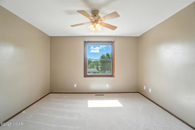 591 Monticello Ave Unit A, Lima, OH 45804 - carpeted empty room featuring baseboards and ceiling fan