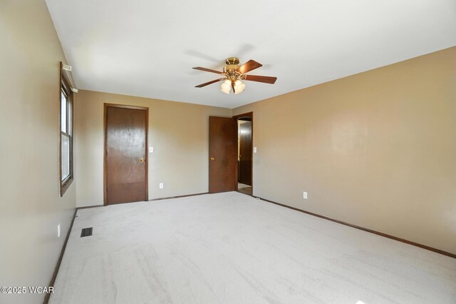 591 Monticello Ave Unit A, Lima, OH 45804 - unfurnished bedroom with carpet and a ceiling fan