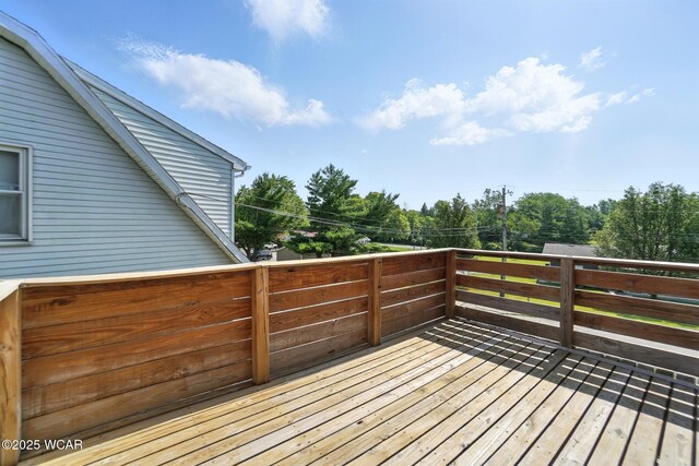 591 Monticello Ave Unit A, Lima, OH 45804 - wooden deck featuring view of wooded area