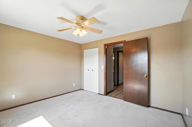 591 Monticello Ave Unit A, Lima, OH 45804 - unfurnished bedroom with carpet, a closet, and ceiling fan