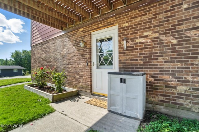591 Monticello Ave Unit A, Lima, OH 45804 - entrance to property with brick siding
