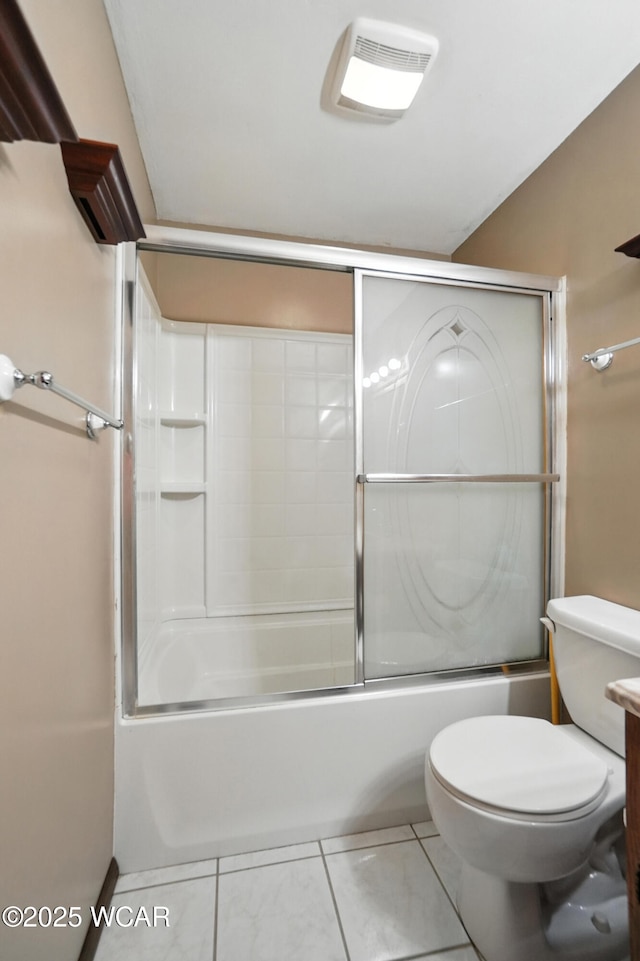 591 Monticello Ave Unit A, Lima, OH 45804 - bathroom featuring bath / shower combo with glass door and tile patterned flooring