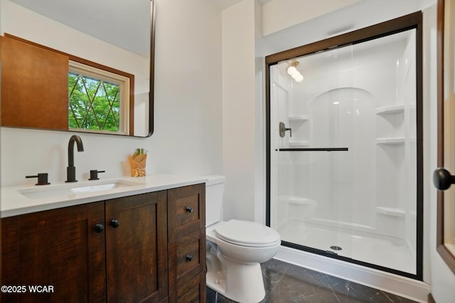 1257 Timberlane Dr, Lima, OH 45805 - full bath with a stall shower, vanity, toilet, and marble finish floors