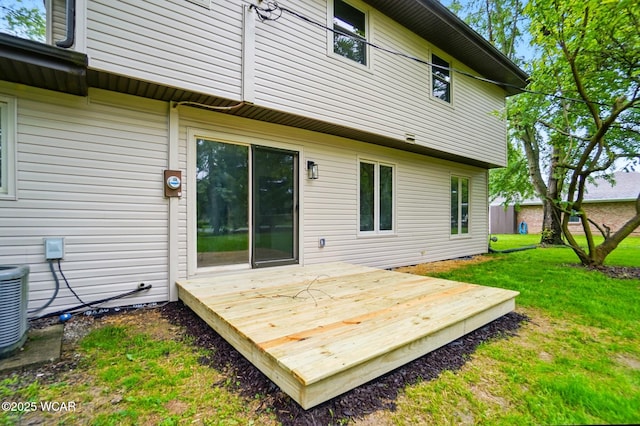 1257 Timberlane Dr, Lima, OH 45805 - back of house with a wooden deck, a yard, and central AC unit