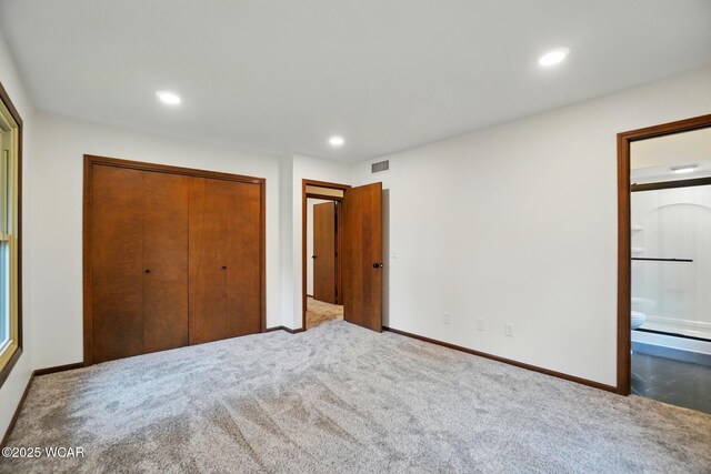 1257 Timberlane Dr, Lima, OH 45805 - unfurnished bedroom with a closet, carpet floors, recessed lighting, and baseboards