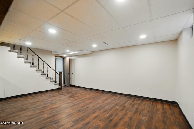 1257 Timberlane Dr, Lima, OH 45805 - finished below grade area featuring dark wood-style flooring, baseboards, stairs, and recessed lighting