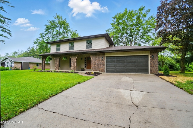 1257 Timberlane Dr, Lima, OH 45805 - traditional home with brick siding, a porch, driveway, and a front yard