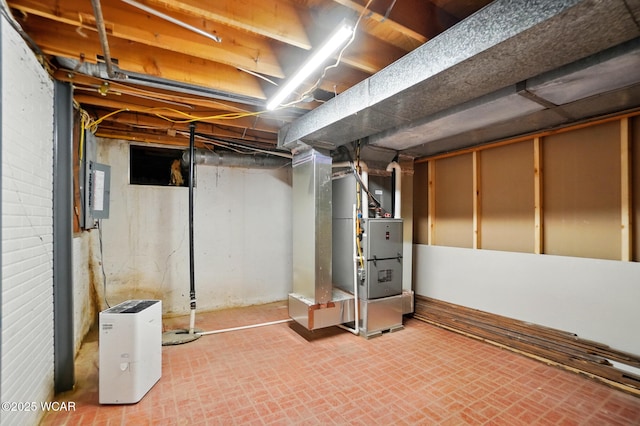 1257 Timberlane Dr, Lima, OH 45805 - unfinished below grade area with electric panel and heating unit