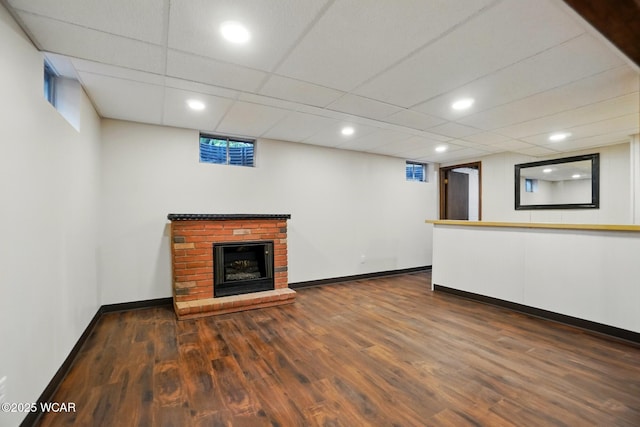 1257 Timberlane Dr, Lima, OH 45805 - unfurnished living room featuring wood finished floors, baseboards, recessed lighting, and a fireplace