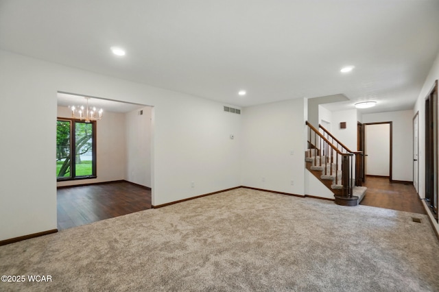 1257 Timberlane Dr, Lima, OH 45805 - empty room with carpet, stairs, a chandelier, recessed lighting, and baseboards