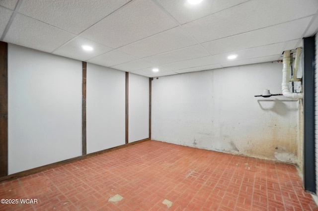 1257 Timberlane Dr, Lima, OH 45805 - finished basement with brick patterned floors, recessed lighting, and a drop ceiling