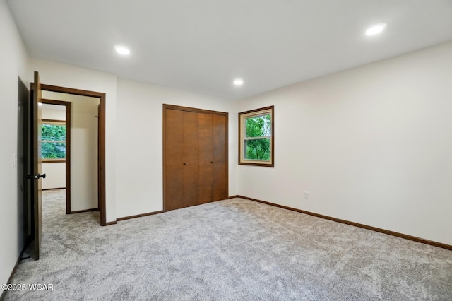 1257 Timberlane Dr, Lima, OH 45805 - unfurnished bedroom with carpet floors, baseboards, a closet, and recessed lighting