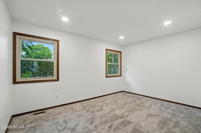 1257 Timberlane Dr, Lima, OH 45805 - carpeted empty room featuring baseboards and recessed lighting