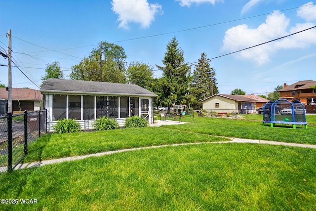 227 N Clay St, Delphos, OH 45833 - view of yard featuring a trampoline and a sunroom