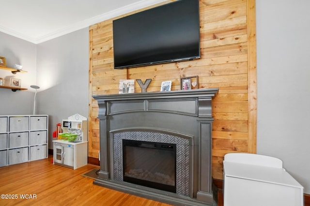 227 N Clay St, Delphos, OH 45833 - detailed view of a glass covered fireplace, wood finished floors, and crown molding