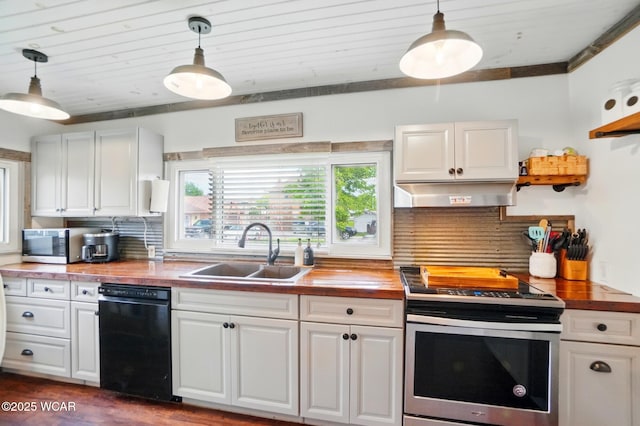 227 N Clay St, Delphos, OH 45833 - kitchen with wood counters, stainless steel appliances, a sink, under cabinet range hood, and backsplash