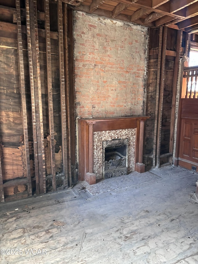 unfurnished living room with exterior fireplace