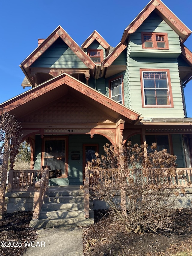 view of front of property featuring covered porch