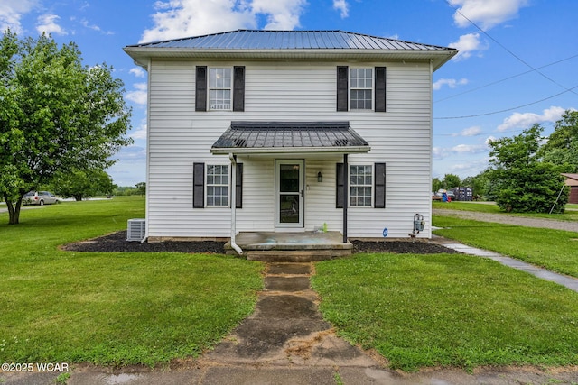 514 W Taylor St, Mount Victory, OH 43340 - traditional-style home featuring a metal roof and a front lawn