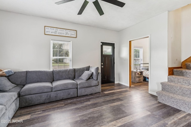 514 W Taylor St, Mount Victory, OH 43340 - living area with dark wood-type flooring, stairway, and ceiling fan