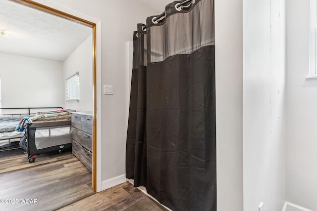514 W Taylor St, Mount Victory, OH 43340 - full bathroom featuring wood finished floors and a shower with curtain