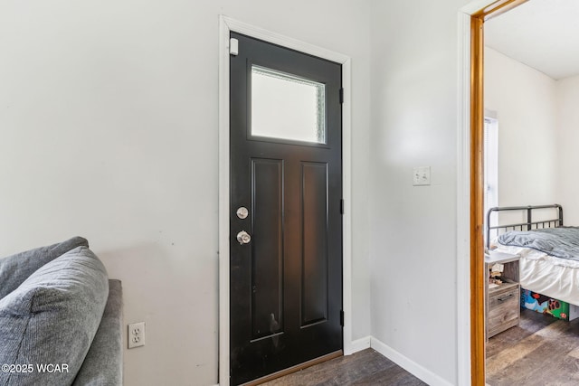 514 W Taylor St, Mount Victory, OH 43340 - foyer with dark wood-type flooring and baseboards