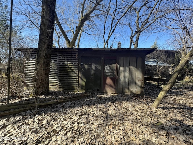 view of outbuilding with an outdoor structure