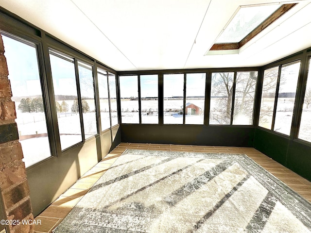 unfurnished sunroom with plenty of natural light