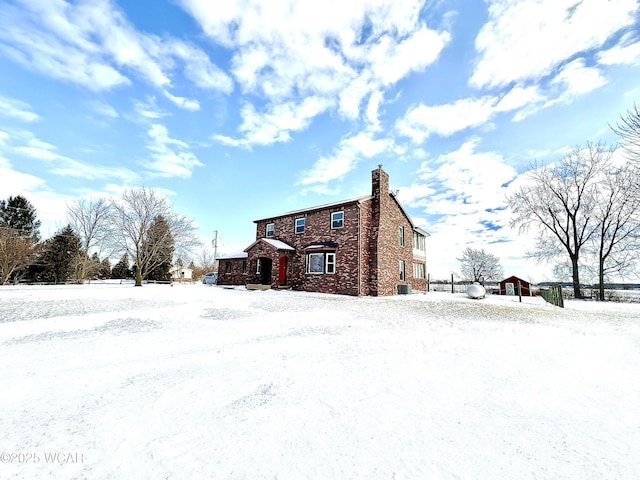 view of snow covered property