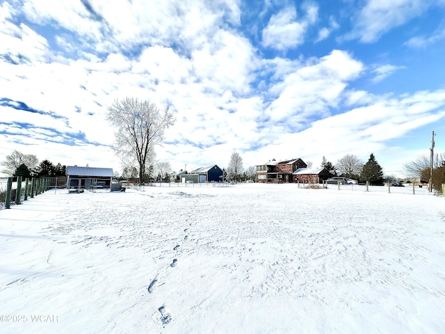 view of snowy yard