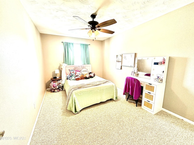 bedroom featuring a textured ceiling and ceiling fan