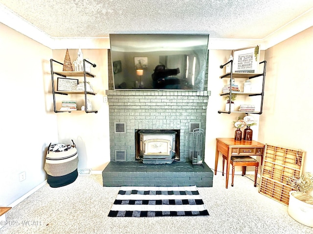 living room with a textured ceiling and a wood stove