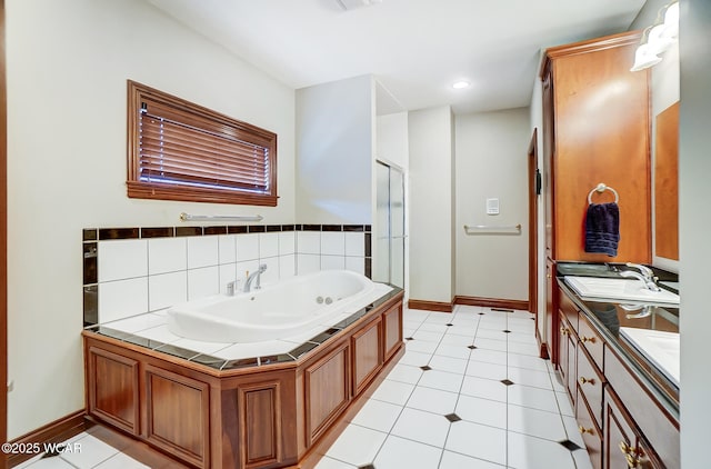 bathroom with tasteful backsplash, vanity, shower with separate bathtub, and tile patterned floors