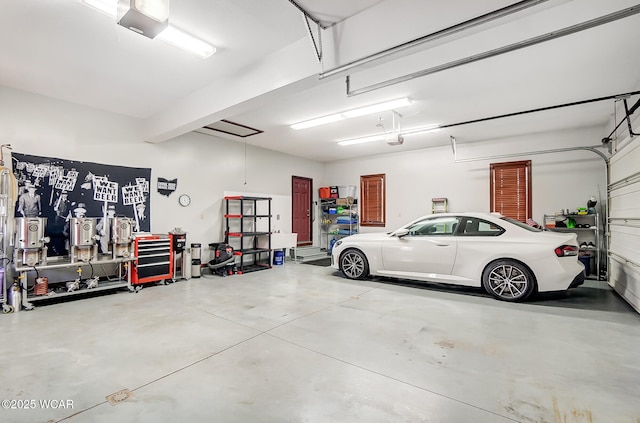 garage featuring a garage door opener