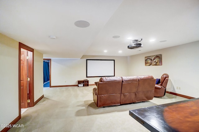 home theater room with light carpet