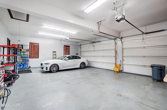 garage featuring a garage door opener