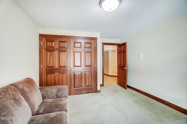 sitting room with light colored carpet