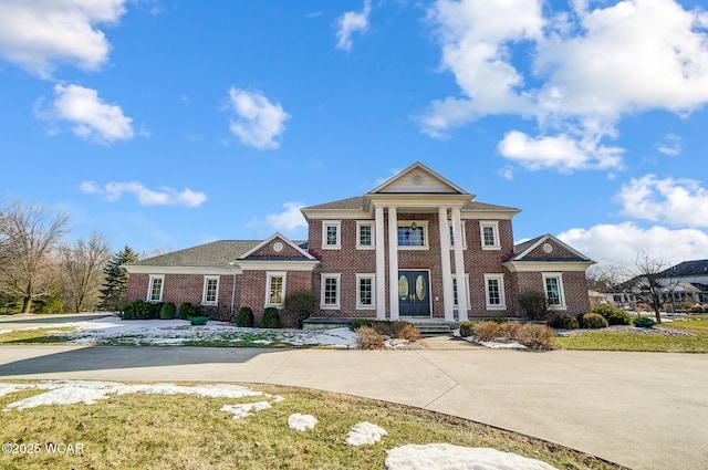 greek revival house with french doors